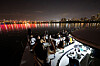 People enjoy a yacht ride near Sebitseom, a cultural complex on the Han River, at Banpo Hangang Park in southern Seoul on Feb. 29, 2022. [WOO SANG-JO]