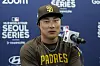 San Diego Padres' Kim Ha-seong attends a news conference at Gocheok Sky Dome in western Seoul on Saturday. [AP/YONHAP]