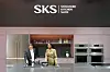 Participants at the Design and Construction Week 2025 try out the premium built-in appliances of SKS, owned by LG Electronics, at a venue in Las Vegas on Feb. 25. [LG ELECTRONICS]