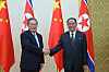 North Korean Premier Pak Thae-song, right, shakes hands with Chinese Premier Li Qiang during their talks in Pyongyang on Oct. 11. [NEWS1]