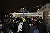 People try to enter the National Assembly as police block the entrance to the National Assembly building late Tuesday night [JOONGANG ILBO]