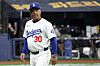 Los Angeles Dodgers' manager Dave Roberts walks back to the dugout during an exhibition game between the Los Angeles Dodgers and Kiwoom Heroes at Gocheok Sky Dome in western Seoul on Sunday.  [AP/YONHAP]