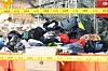 Bags and suitcases belonging to victims of the Jeju Air crash are seen scattered at the crash site at Muan International Airport in South Jeolla on Jan. 2. [YONHAP]