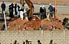 A joint investigation team recovers the plane's engine buried in the embankment of a localizer at the Jeju Air crash site at Muan International Airport in South Jeolla on Jan. 2. [YONHAP]