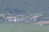 North Korean residents are seen working on their farms, as observed from South Korea's city of Paju, Gyeonggi, on July 29. [YONHAP]