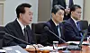 President Yoon Suk Yeol, left, speaks at a Cabinet meeting at the Yongsan presidential office in central Seoul on Tuesday. [JOINT PRESS CORPS]