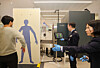 Lee Myeong-ku, center, commissioner of the Korea Customs Service, conducts a passenger screening using advanced body-scanning equipment, including millimeter-wave technology, during an antidrug inspection campaign at Incheon International Airport’s Terminal 1 on Dec. 22. [KOREA CUSTOMS SERVICE]
