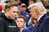 Tesla CEO Elon Musk greets U.S. President Donald Trump as they attend the NCAA men's wrestling championships in Philadelphia, Pennsylvania, U.S., March 22, 2025. REUTERS/Nathan Howard