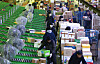 Workers sort parcels at a logistics center in southern Seoul in January. [YONHAP]