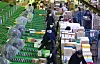 Workers sort parcels at a logistics center in southern Seoul in January. [YONHAP]
