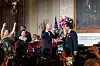 U.S. President Joe Biden, center, and Broadway stars, left, react as Korean President Yoon Suk Yeol, right, sings ″American Pie″ by Don McLean during a state dinner at the White House in Washington on April 26. [JOINT PRESS CORPS]