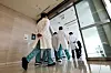 Doctors walk inside a general hospital in Seoul on Feb. 8, 2024, two days after the government announced its plan to add 2,000 new seats in medical schools' admissions. [YONHAP]