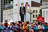People wait in front of an image of Japan's Emperor Naruhito and Empress Masako ahead of a welcome ceremony for them at Sukhbaatar Square in Ulaanbaatar, Mongolia, on July 8. [REUTERS/YONHAP]