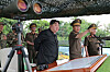 This photo, published by North Korea's state-run Korean Central News Agency on July 24, shows North Korean leader Kim Jong-un observing a firing contest by artillery subunits of the Korean People's Army on July 23. [YONHAP]