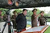 This photo, published by North Korea's state-run Korean Central News Agency on July 24, shows North Korean leader Kim Jong-un observing a firing contest by artillery subunits of the Korean People's Army on July 23. [YONHAP]