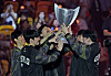 Gen.G players lift the LCK 2024 Spring trophy after defeating T1 3-2 in the final round of the playoffs on Sunday at the KSPO Dome in southern Seoul. [NEWS1]
