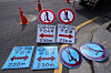 Notices banning electric scooters are seen ready to be hung on a street in Seocho District, southern Seoul, on May 13. [YONHAP]