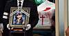 A family member of Kim Ha-neul, a 7-year-old stabbing victim, carries her portrait during her funeral service in the central city of Daejeon on Feb. 14. [YONHAP]