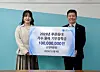Singer Younha poses for photos after promising to donate 100 million won ($68,000) to the Korea Student Aid Foundation on Dec. 9. [C9 ENTERTAINMENT