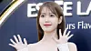 Singer IU poses for photos at a pop-up store opening event for a makeup brand in eastern Seoul on Feb. 1, 2024. [NEWS1]