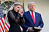 Erika Kirk wipes her eyes as a military aide reads the citation before President Donald Trump posthumously awards the Presidential Medal of Freedom to her late husband Charlie Kirk in the Rose Garden of the White House, Oct. 14, in Washington. [AP/YONHAP]