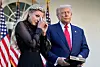 Erika Kirk wipes her eyes as a military aide reads the citation before President Donald Trump posthumously awards the Presidential Medal of Freedom to her late husband Charlie Kirk in the Rose Garden of the White House, Oct. 14, in Washington. [AP/YONHAP]