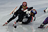 Rim Jong-un, center, slips and falls during the men’s 1,500 meters semifinal in short track speed skating at the 2026 Milan-Cortina Winter Olympics, held at the Milano Ice Skating Arena in Italy on Feb. 14. [JOONGANG ILBO]