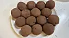 A group of Dubai chewy chocolates, their dents and flaws covered with a dusting of chocolate powder [WOO JI-WON]