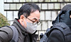 Former Vice Land Minister Kim Oh-jin leaves the Seoul Central District Court in southern Seoul on Dec. 16, after attending his arrest warrant hearing. [NEWS1]