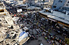 People gather and shop at a local market, in Nuseirat, central Gaza Strip, Oct. 28. [REUTERS/YONHAP]