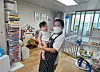 A Filipino caregiver holds a baby at a household in Seoul on Sept. 3. [SEOUL METROPOLITAN GOVERNMENT]