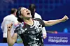 Korea's An Se-young celebrates after defeating China's Chen Yufei in their women's singles badminton gold medal match at the 19th Asian Games in Hangzhou, China on Oct. 7. [AP/YONHAP]