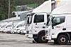 Vehicles are seen at a Coupang logistics center in Seoul on Aug. 6. [YONHAP]
