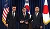 South Korean National Security Adviser Cho Tae-yong, center, poses for a photo with U.S. National Security Adviser Jake Sullivan, left, and Japanese National Security Secretariat Secretary General Takeo Akiba, right, after their joint press briefing at the Yongsan presidential office in central Seoul Saturday. [JOINT PRESS CORPS]