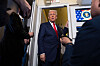 U.S. President Donald Trump speaks with reporters aboard Air Force One shortly after taking off from Busan on Oct. 30. [AP/YONHAP]