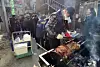 Residents of Daegu's Buk District hold a pork barbecue party to oppose the construction of an Islamic mosque in Daehyeon-dong on Dec. 15, 2022. [YONHAP]