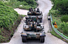 This photo taken on July 3, shows K2GF main battle tanks during a military exercise held in Hongcheon, 86 kilometers east of Seoul. [YONHAP]