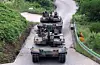 This photo taken on July 3, shows K2GF main battle tanks during a military exercise held in Hongcheon, 86 kilometers east of Seoul. [YONHAP]