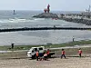 Jeju City officials are seen clearing away seaweed at Iho Beach in Jeju on May 7, 2024. [JOONGANG PHOTO]