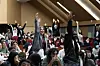 Students raise hands to answer questions during the orientation of the Sookmyung-Minerva Exchange Program held on Jan. 13. [SOOKMYUNG WOMEN'S UNIVERSITY]