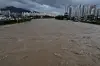 The Jungnang Stream is flooded due to the heavy torrential rains on Aug. 13 in Uijeongbu, Gyeonggi. [YONHAP]