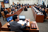 Kim Sang-hoon, front, head of a parliamentary special committee to advance a U.S. investment bill, attends its first plenary session at the National Assembly in Seoul on Feb. 12.  [YONHAP]