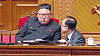 Jo Yong-won, right, kneels and reports to Kim Jong-un in an image captured on Korean Central Television on Jan. 9, 2021. [YONHAP]