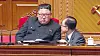 Jo Yong-won, right, kneels and reports to Kim Jong-un in an image captured on Korean Central Television on Jan. 9, 2021. [YONHAP]