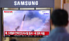 People watch a news broadcast at the waiting room of Seoul Station in Jung District, central Seoul, as North Korea fired ballistic missiles on Oct. 22, 2025. [NEWS1]