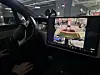 A Tesla Model X vehicle parks itself inside an underground parking lot while in Full Self-Driving mode. [KIM HYO-SEONG]