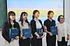 Yuhan Sun, center, and Heartyworks' CEO Kim Hyeon-jin, second from right, pose for a group photo at Cheongdo University. [HEARTYWORKS]