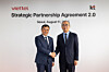 KT CEO Kim Young-shub, right, and Viettel Group Chairman and CEO Tao Duc Thang, left, shake hands during a signing ceremony for a “Strategic Partnership 2.0” agreement between their companies at KT’s Gwanghwamun building in central Seoul on Aug. 11. [KT]