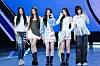 Girl group Meovv poses for photos during a showcase at SBS Prism Tower in western Seoul for the release of its first EP “My Eyes Open VVide” on May 12. [DANIELA GONZALEZ PEREZ]
