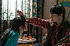 Jung-hwan, portrayed by Jo Jung-suk, uses his animal taming skills to train his zombie daughter, Soo-ah, in this still of the Korean film ″My Daughter is a Zombie.″ [NEW]